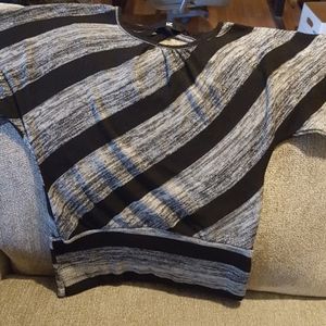 Short sleeved blouse with specs of silver woven in